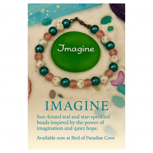 Handmade celestial bracelet displayed with an Imagine affirmation card, highlighting mindfulness and intention.