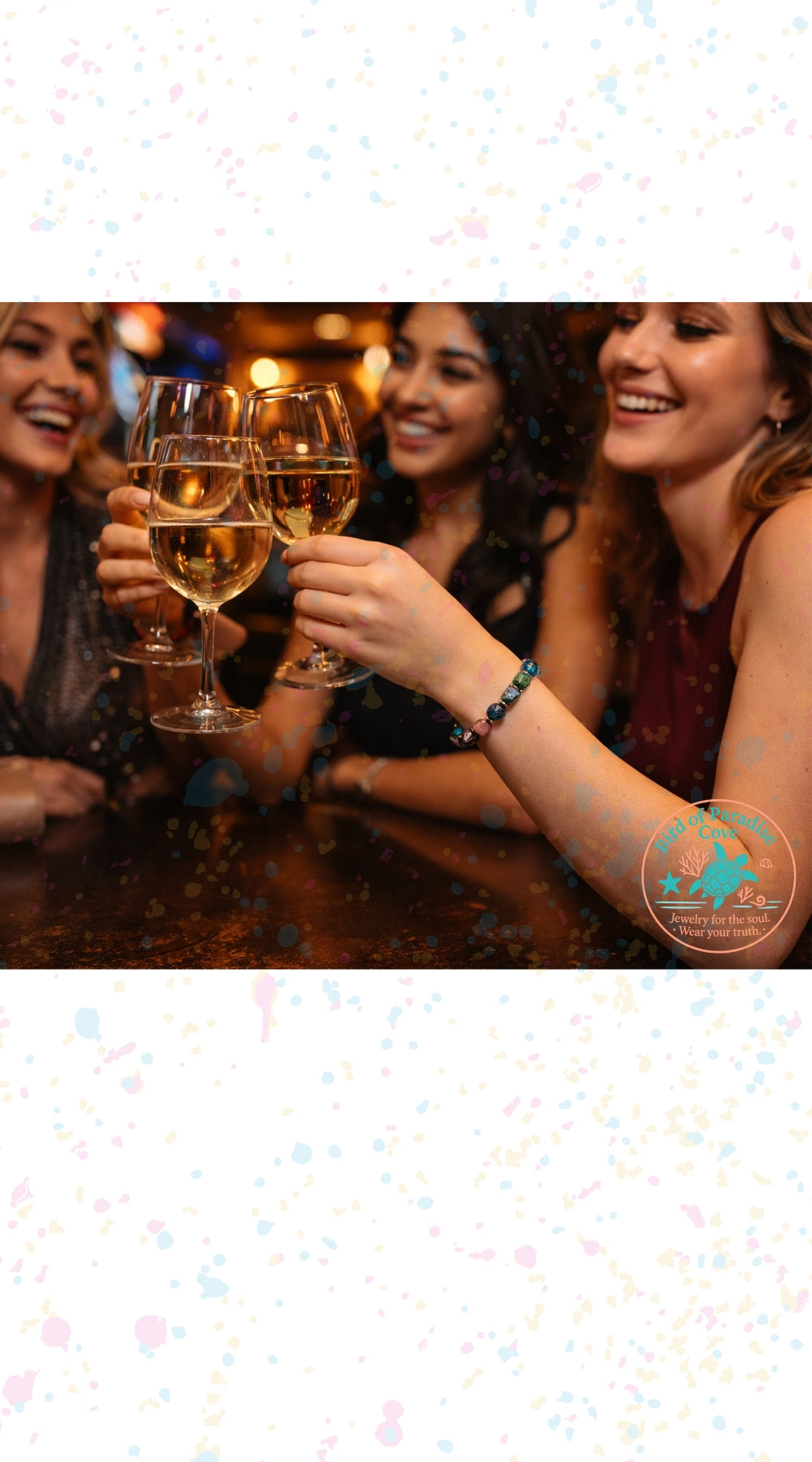 Girls night out lifestyle photo featuring friends toasting with wine while wearing the Afterglow gemstone bracelet.
