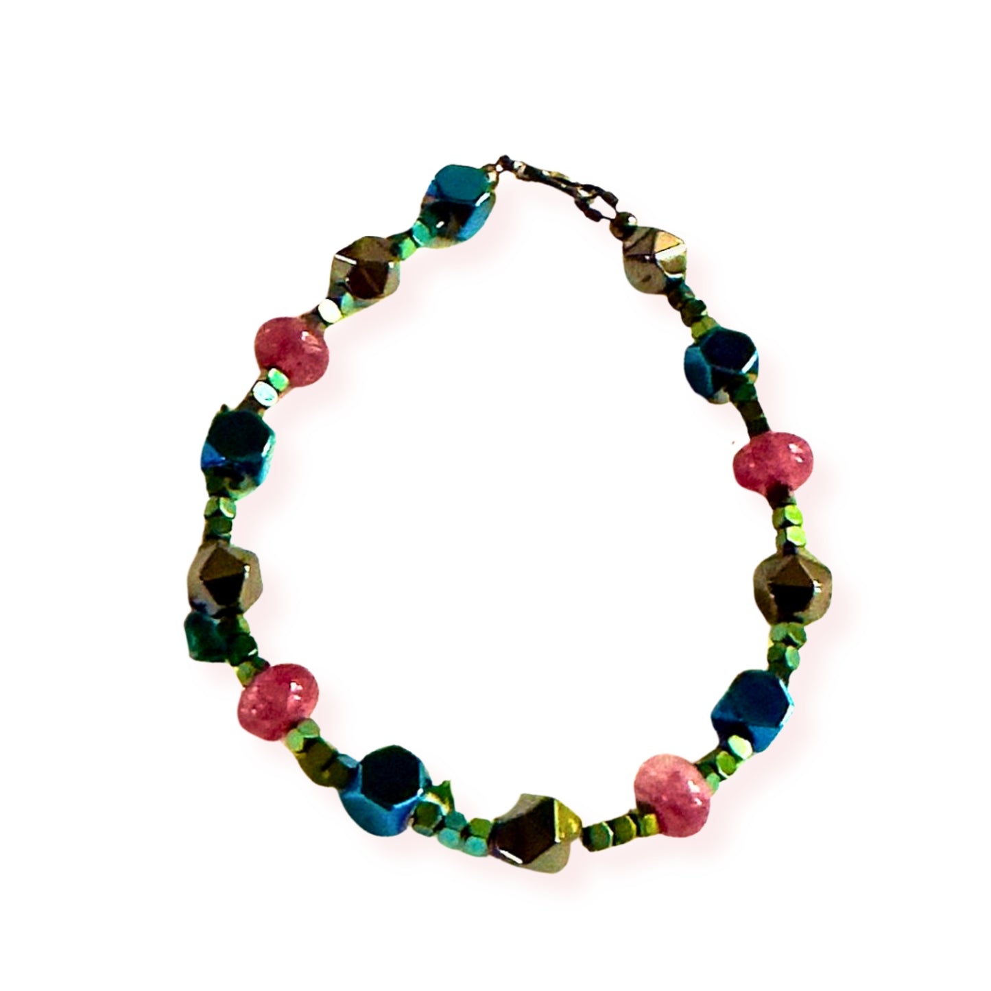 Afterglow gemstone bracelet photographed in an oval shape emphasizing bead color variation and sparkle.