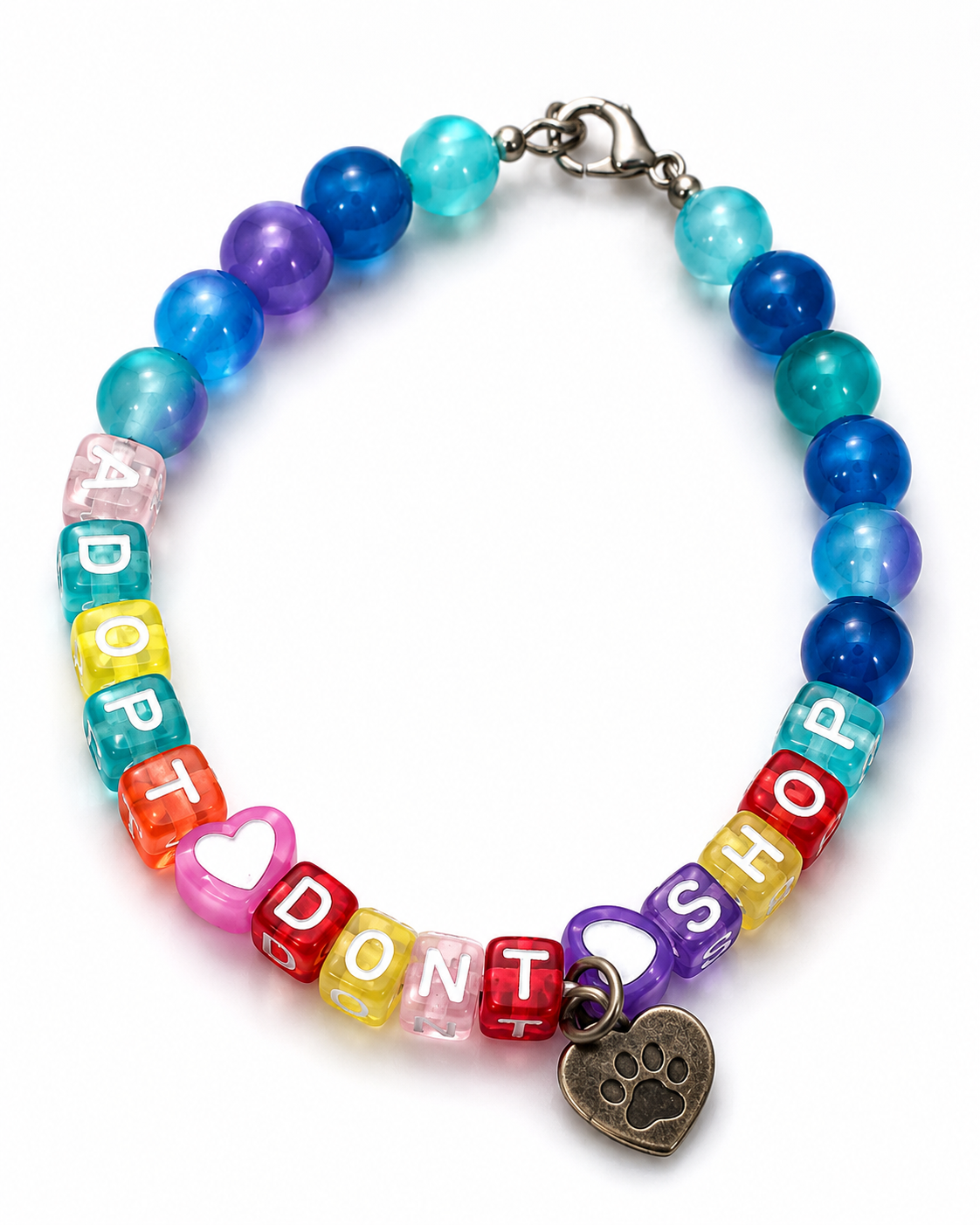 Handmade pet adoption awareness bracelet featuring colorful beads spelling “Adopt Don’t Shop,” accented with heart beads and a paw print charm on a white background.