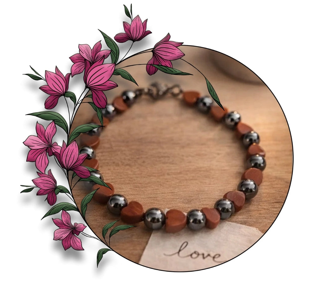 Heart bead bracelet styled with pink flowers for romantic gift idea