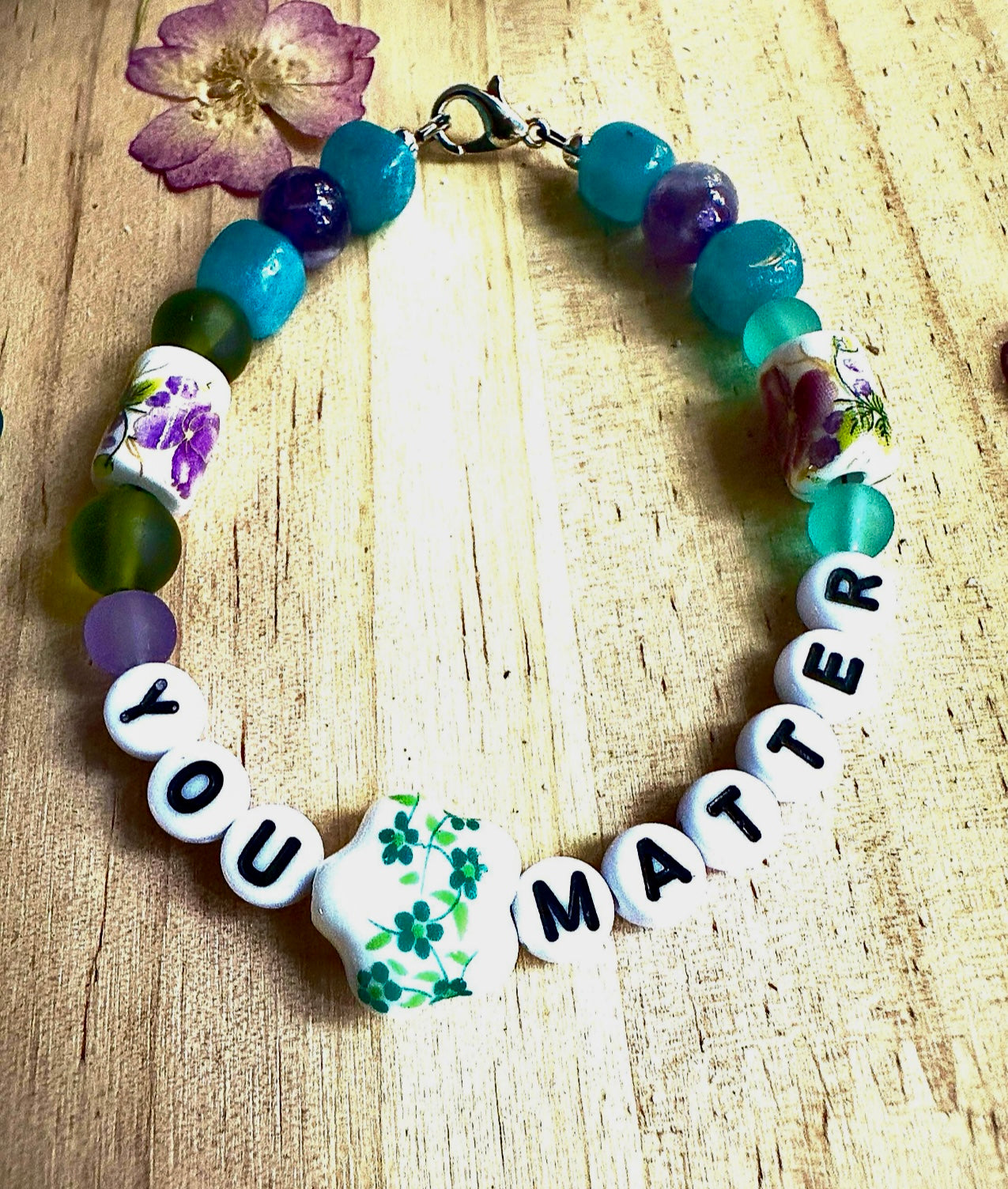 Handmade beaded “You Matter” bracelet displayed clearly, inspirational jewelry designed to promote self-worth and emotional support.