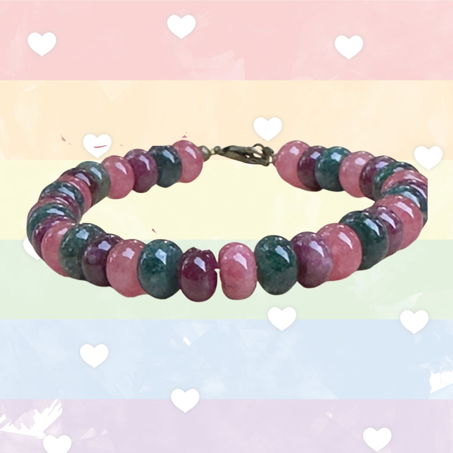 Multicolored beaded bracelet on a pastel background with heart shapes