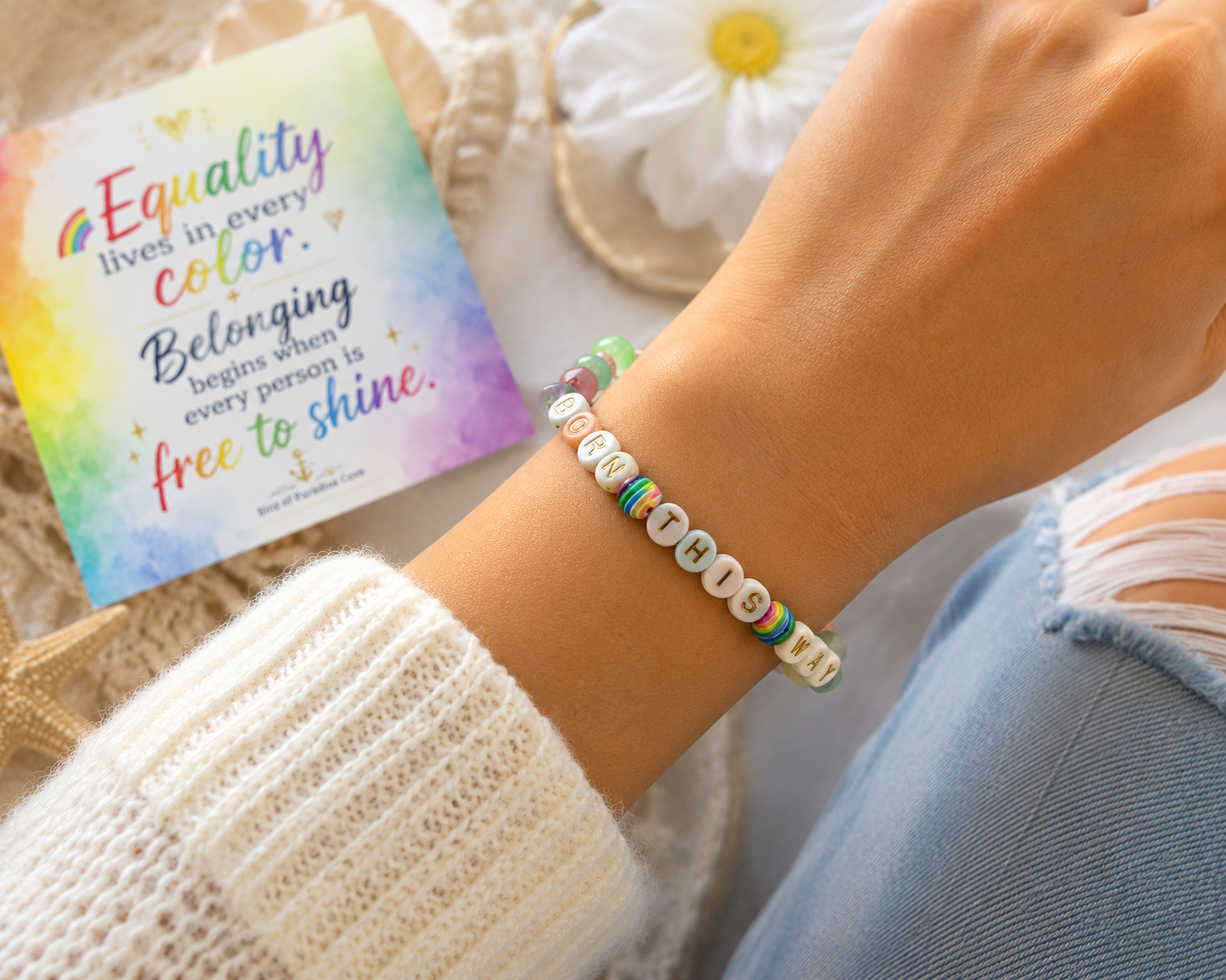 Close-up of rainbow Pride bracelet highlighting colorful beads and handmade details.