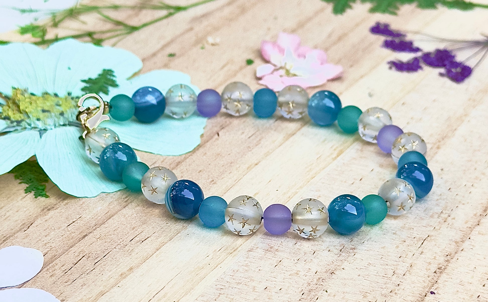 Celestial Opalite Sky bracelet photographed from a different angle to show bead color and clasp detail