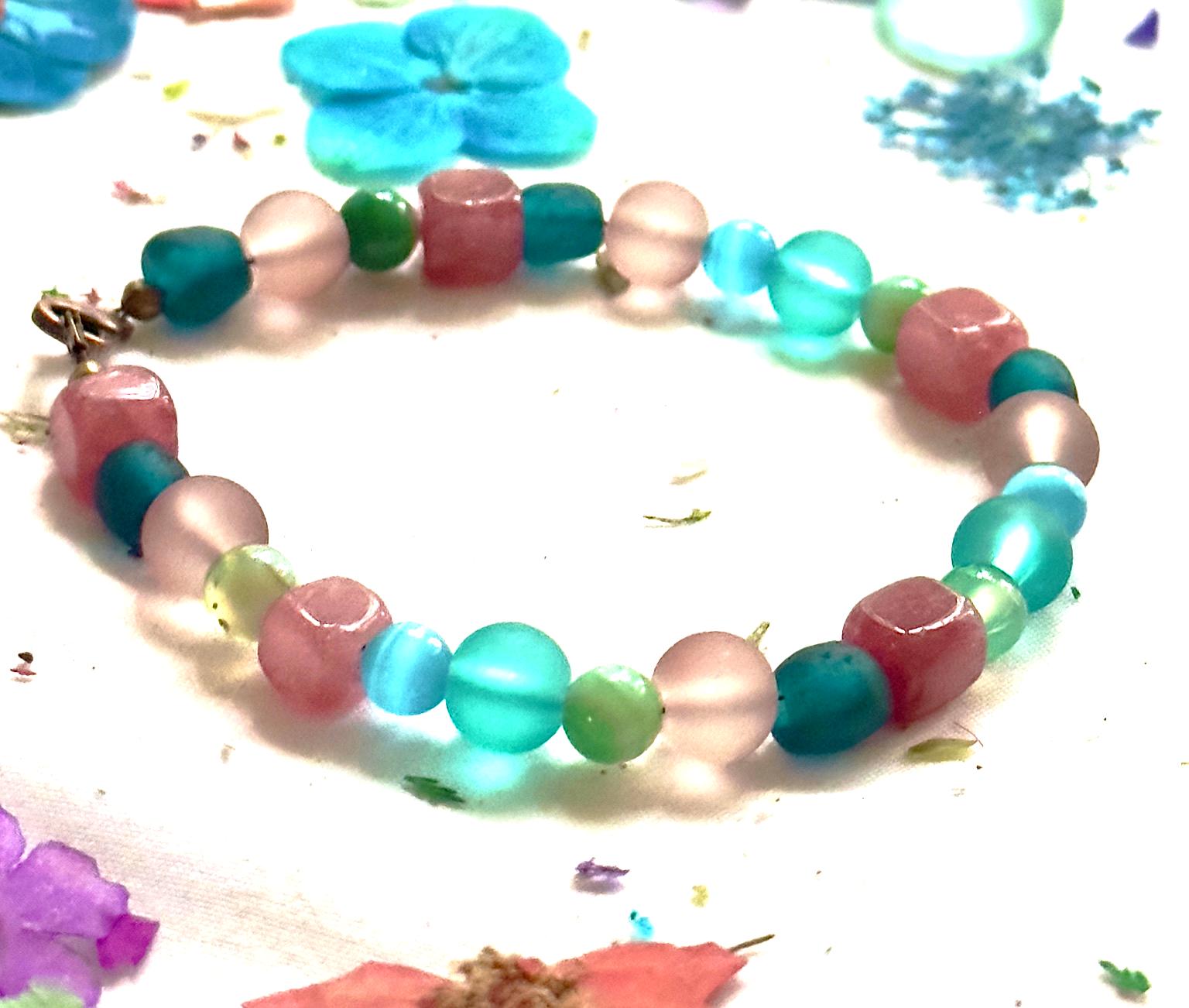 side view of pastel gemstone bracelet showing bead arrangement and design handmade jewelry