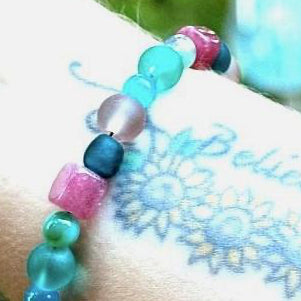 pink and teal gemstone bracelet worn on wrist everyday handmade jewelry styling