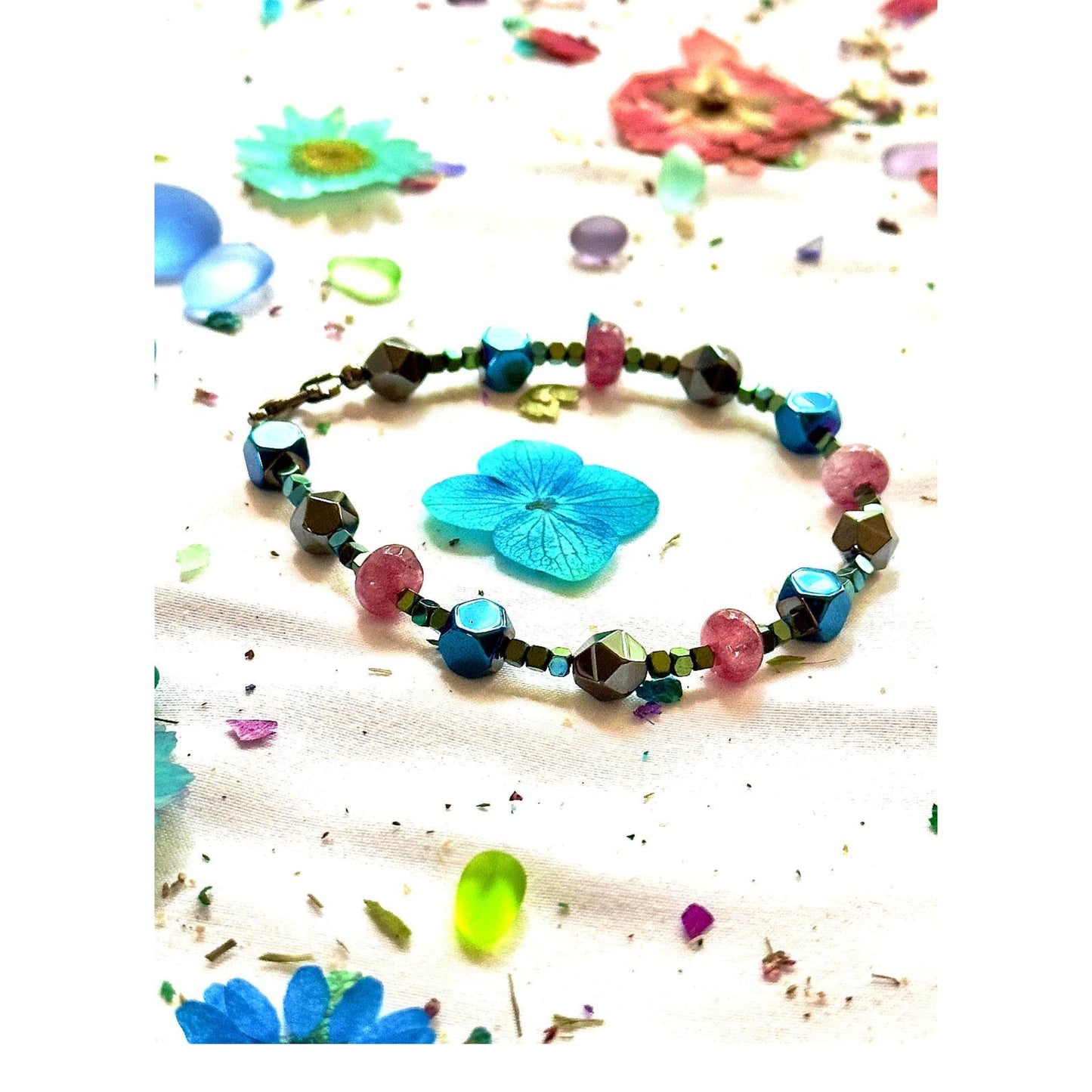 Celestial inspired beaded bracelet with vibrant lagoon colors and whimsical design