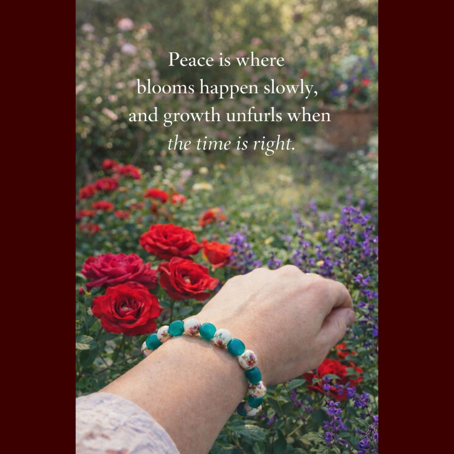 Hand wearing a bracelet with red roses and flowers in the background, featuring a quote about peace and growth.