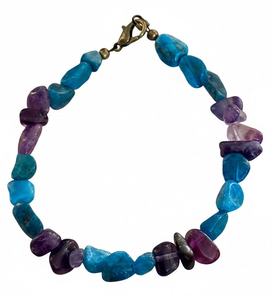     Handmade Apatite and Amethyst gemstone bracelet with brass clasp isolated on white background for mental health awareness jewelry listing