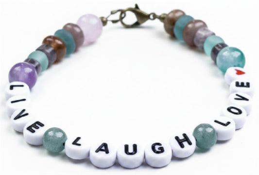 Handmade gemstone beaded bracelet with “Live Laugh Love” letter beads, pastel tones, and lobster clasp on white background