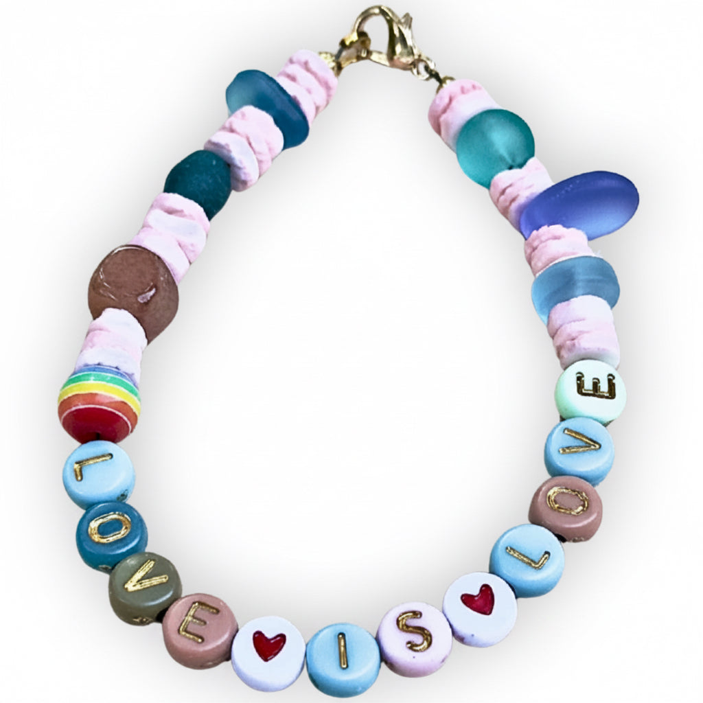 Colorful beaded keychain with letter beads spelling out 'LOVE' on a white background