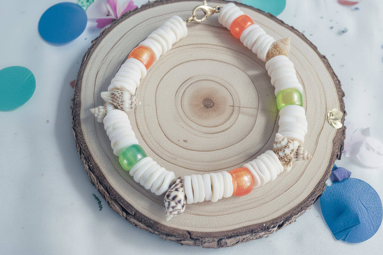     Beach inspired shell bracelet styled on wood decor. 