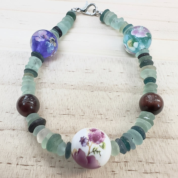 Frosted green sea glass beads with earthy gemstone accents on bracelet