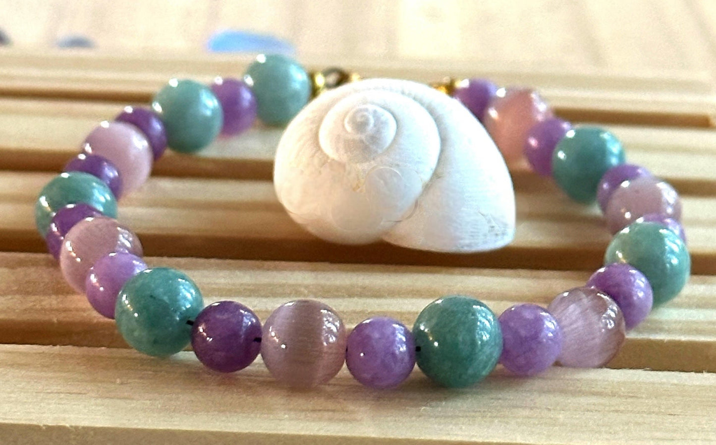Close-up of Spring Garden Serenity bracelet highlighting lavender, aqua, and blush pink beads.