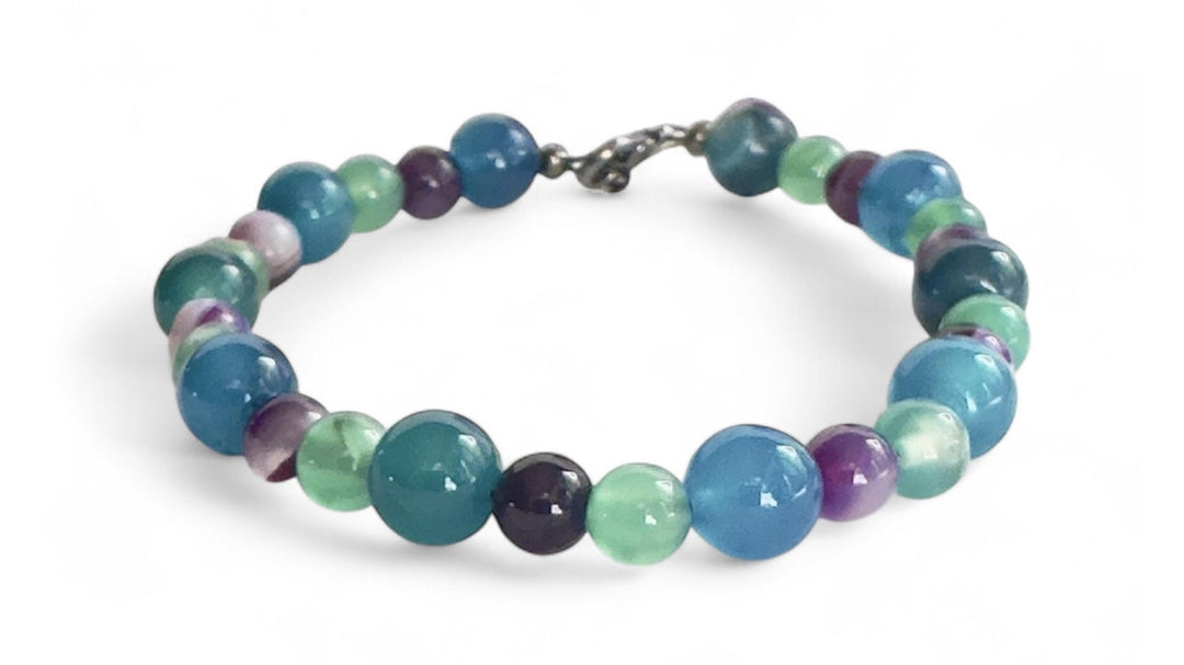 Summertide Dreams ocean inspired gemstone bracelet with blue, aqua, green, and purple beads.