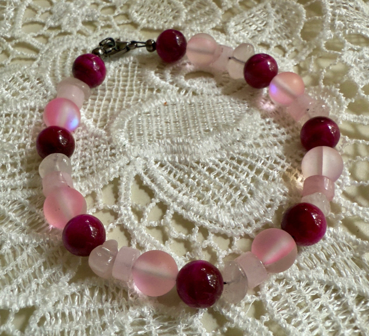 Together in Pink ・ Held in Hope new bracelet made of glass, magenta Tiger’s Eye, and Rose Quartz beads.
