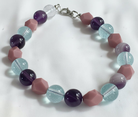 Velvet Moon Glow bracelet flat lay with dreamy pastel gemstone beads and soft coastal styling