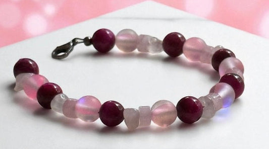 Together in Pink ・ Held in Hope new bracelet featuring glass, magenta Tiger’s Eye, and Rose Quartz.